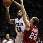 Butler forward Roosevelt Jones (21) shoots over Richmond forward Greg Robbins in the first half of an NCAA college basketball game in Indianapolis, Wednesday, Jan. 16, 2013. (AP Photo/Michael Conroy)