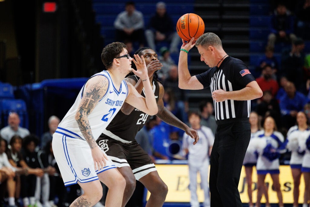 SLU's Robbie Avila and St. Bonaventure's Noel Brown get ready for the opening tip