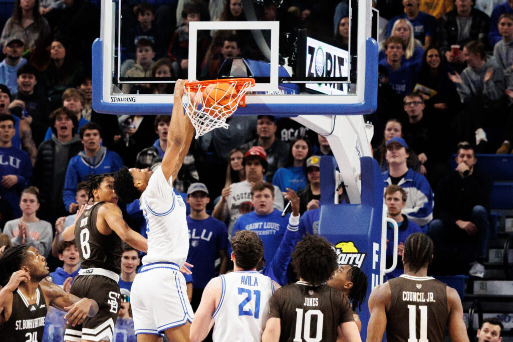 SLU sophomore guard Thames finishes off a no-look pass from Avila with a dunk