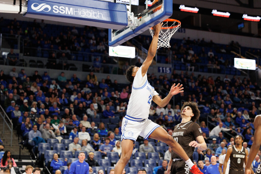SLU's Kellen Thames goes up for a reverse layup