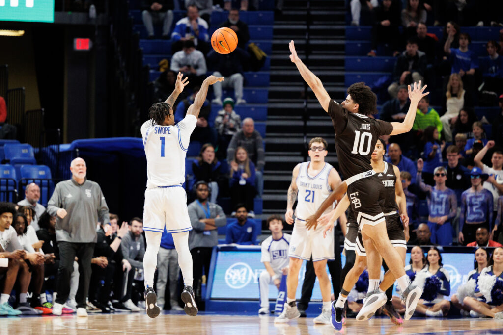 Senior guard Isaiah Swope puts up a 3-pointer for the Billikens
