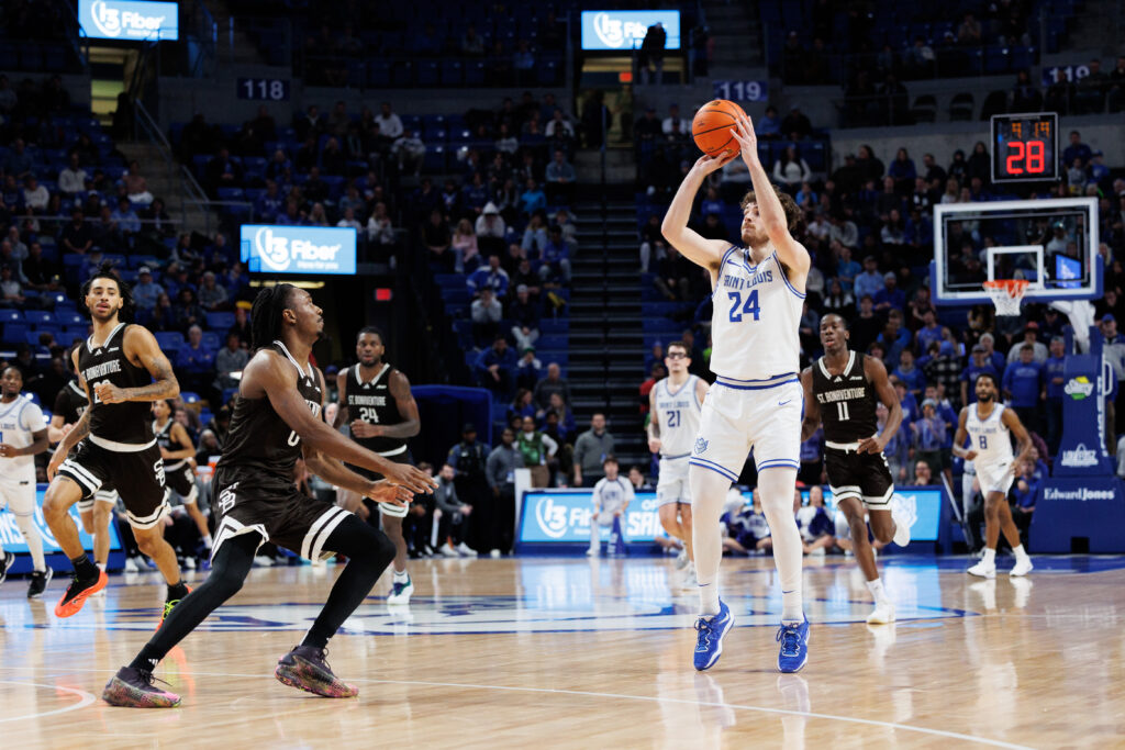 Senior guard Gibson Jimerson makes a three pointer. Jimerson led all scorers with 28 points, including 6 threes
