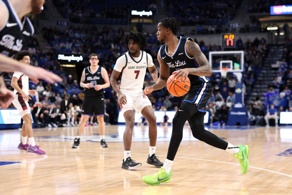 Junior forward Kalu Anya handles the ball for St. Louis