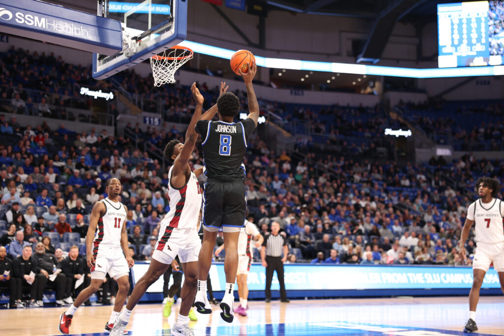 Billiken senior Kobe Johnson drains a short second half jumper against St. Joe's