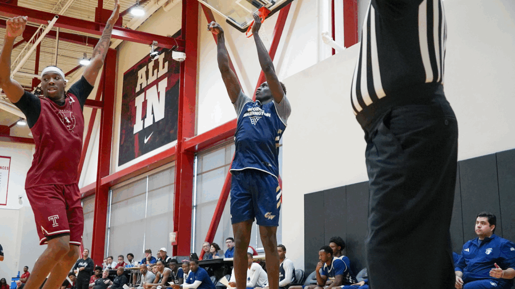 Bubu Benjamin shoots a corner three during a scrimmage vs. Temple / Photo Credit: @GW_MBB