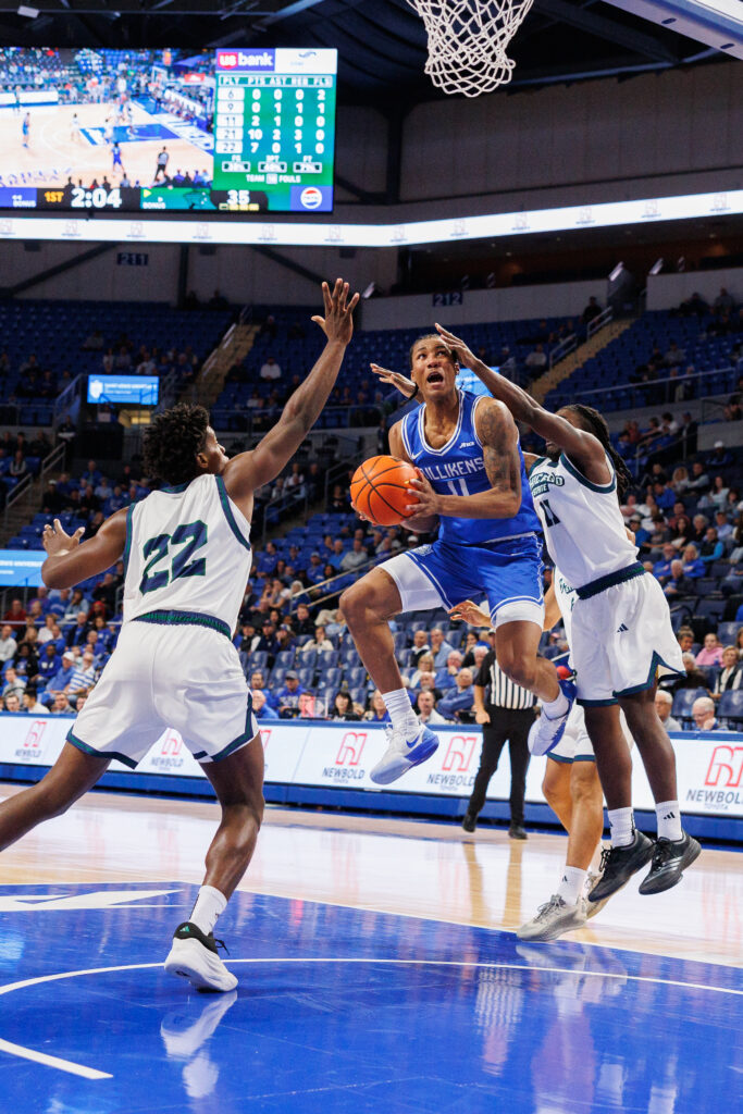 SLU guard Kellen Thames drives past two Chicago State defenders (photo: Jeff Brown)