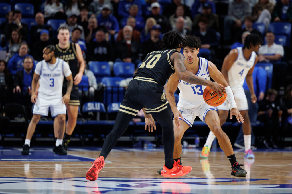 Billiken guard Dion Brown pressures PFW's Corey Hadnot II as he brings the ball up court. (photo: Jeff Brown)