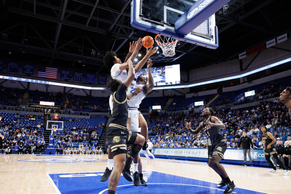 Billiken guard Kellen Thames rises high to pull down one of SLU's 50 total rebounds. (photo: Jeff Brown)